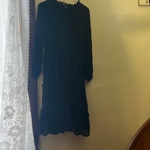 I am selling a Long black dress.